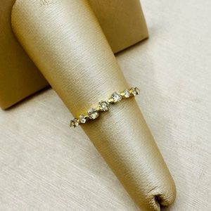 EUC 18k Yellow Gold Curved .60 ctw Diamond Ring